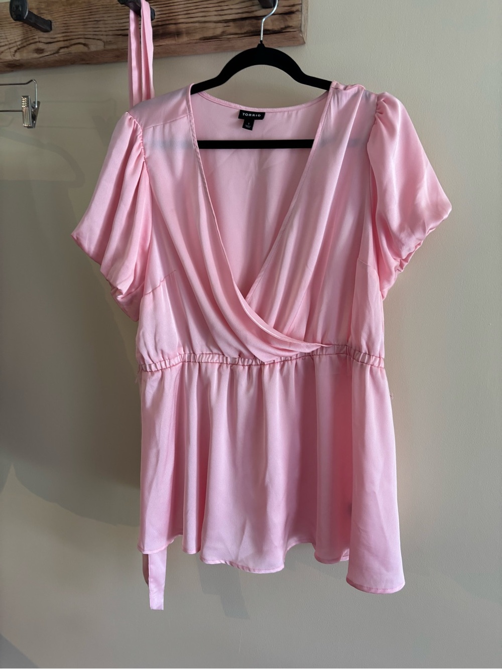 66.) Torrid /  Soft Pink Wrap Blouse